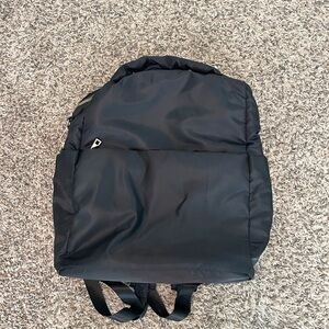 NWOT Black satin like backpack